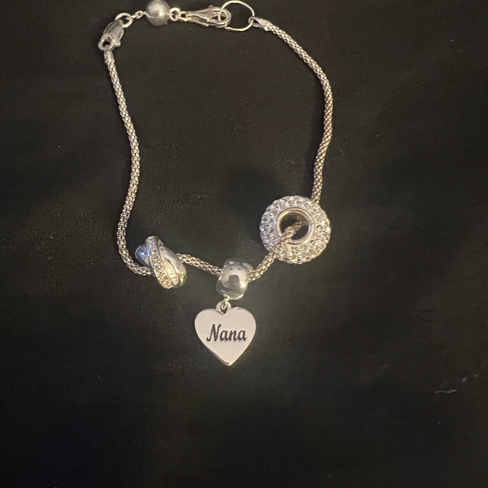 New, never worn. Elegant Silver Nana Heart Charm Bracelet